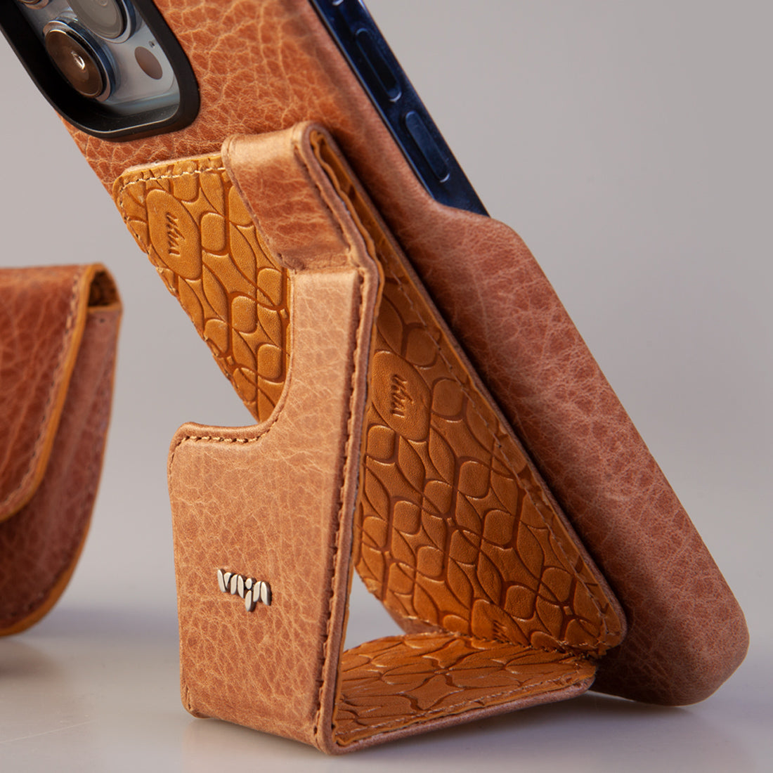 The new Origami Snap-On Stand uses strong magnets to attach securely to your iPhone V-Mag Case
